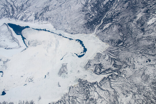 Ariel view over the frozen southern tip of the Hudson Bay in Canada. Digitally enhanced. The elements of this image furnished by NASA.