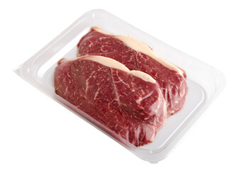 Fresh raw beef steaks in vacuum packaging on a transparent background. isolated object
