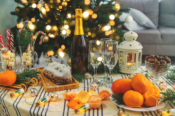 Champagne on the Christmas table. Selective focus.