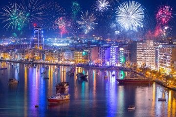 Fireworks display over the Sliema harbor on Malta. - obrazy, fototapety, plakaty