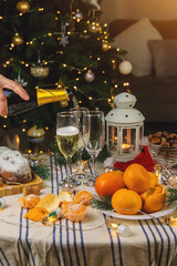 Champagne on the Christmas table. Selective focus.