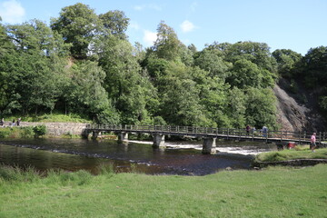 Fototapeta premium River Wharfe and Step-Stone Bridge nearby Bolton Abbey, England Great Britain