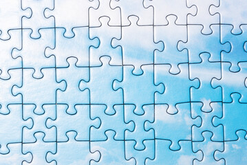 Puzzle. Piece of a puzzle with many pieces. The concept of a whole made up of small parts.