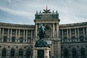 Naklejka premium Prince Eugene Statue in front of Neue Burg in Heldenplatz in Vienna Austria Europe