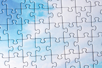 Puzzle. Piece of a puzzle with many pieces. The concept of a whole made up of small parts.