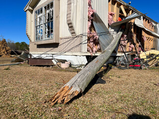 Mobile home damaged due to wind and tornado
