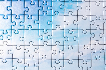 Puzzle. Piece of a puzzle with many pieces. The concept of a whole made up of small parts.