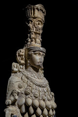 Great Artemis marble statue in Ephesus. Close up fragment, selected focus, black background....