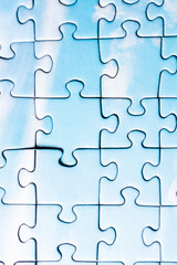 Puzzle. Piece of a puzzle with many pieces. The concept of a whole made up of small parts.