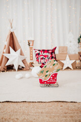 beautiful Christmas decoration at home, star, lights, christmas tree, gifts and ornaments. nobody