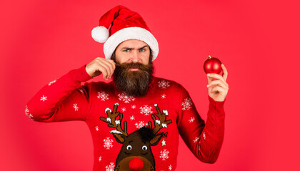 Just for fun. Winter inspiration. New year party decor. Prepare for holiday. Ready to celebrate. Bearded hipster man hold christmas decoration. Decorate your home. Run xmas party. Organise party