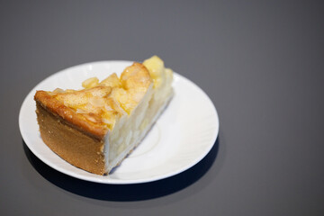 piece of apple pie on white plate