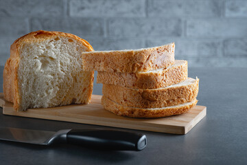 Fresh homemade crisp bread on a gray table