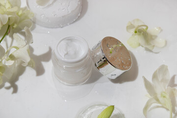 mockup tube bottle for skin care cosmetic with water splash and flower, product branding, serum dropper cream lotion treatment