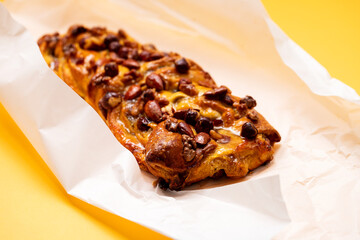 typical portuguese fruit cake Bolo rainha on plate