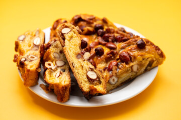 typical portuguese fruit cake Bolo rainha on plate