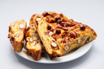 typical portuguese fruit cake Bolo rainha on plate