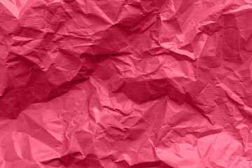 Fototapeta premium Textured paper background. Recycled paper, crumpled paper, red toned. 