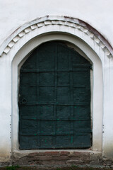 old vintage door on white house