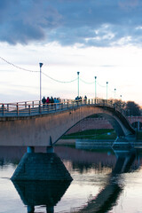 footbridge at sunset over the river
