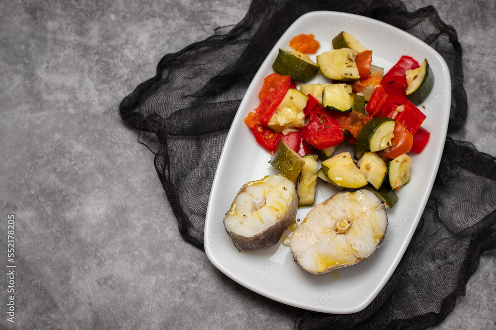 Canvas Prints baked vegetables with boiled fish on white plate