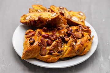 typical portuguese fruit cake Bolo rainha on plate
