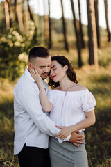 Young couple in love walking in the park