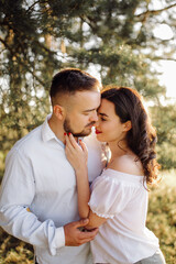 Young couple in love walking in the park