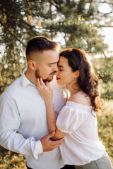 Young couple in love walking in the park