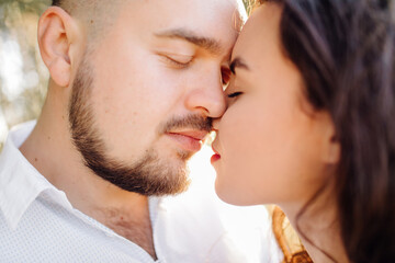 Young couple in love walking in the park