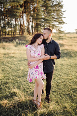 Young couple in love walking in the park