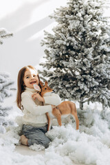Fototapeta na wymiar winter holidays and people concept - happy little girl near christmas tree at home