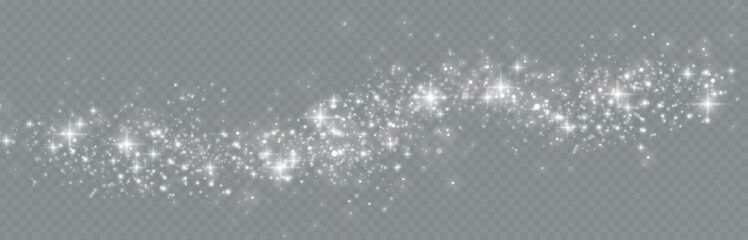 Particles of white magic dust. Shining light particles.Christmas glitter particles. Light effect on a transparent background