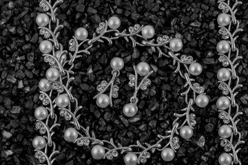 Set of golden bracelet with diamonds over black background