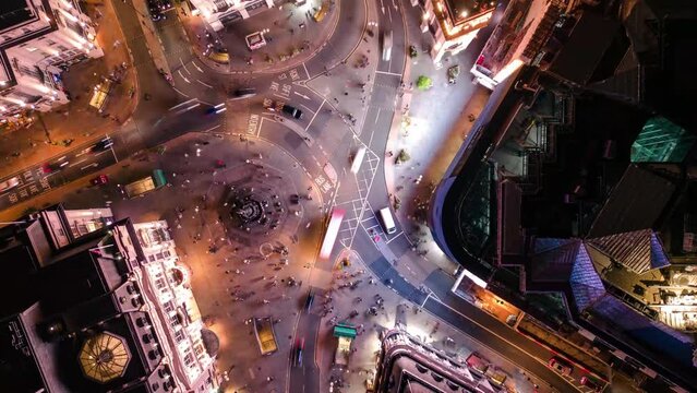 Aerial Drone Top Down Timelapse of London UK Piccadilly Circus Regent Street and Leicester Square at Rush Hour Cars And Double-Decker Bus Driving 
