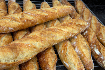 Stack of crispy baguettes at the bakery