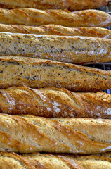 Stack of crispy baguettes at the bakery
