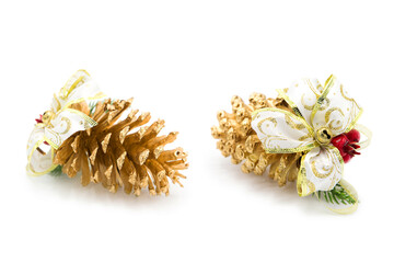 Christmas decor toy isolated on white background. Golden cone with decoration.