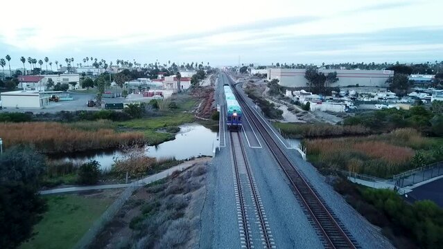 4K Drone Video Of The Coaster Train Heading South Through Oceanside California: Transportation, Travel, Vehicles