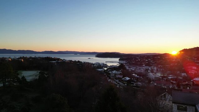 Sunset over the harbor town of Os&oslash;yro, Norway