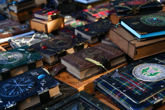 Defocus many books and notebooks. Stack of colorful books. Education background. Back to school. Book, hardback colorful books on wooden table. Education business concept. Out of focus