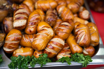 delicious grilled sausages with salad and vegetables