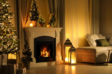 Fototapeta premium Stylish living room interior with beautiful fireplace, Christmas tree