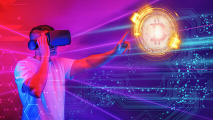 man using virtual reality 3D heastset in cyberspace world with bitcoin coin symbol