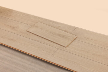 Parquet planks on floor in room prepared for renovation