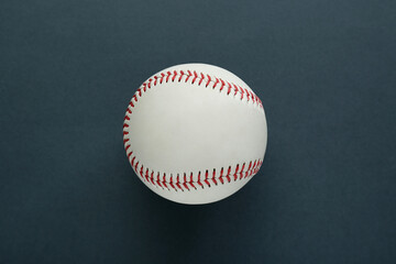 Baseball ball on dark background, top view. Sports game