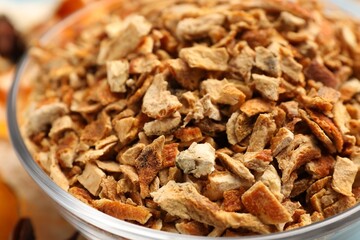 Bowl of dried orange zest seasoning, closeup