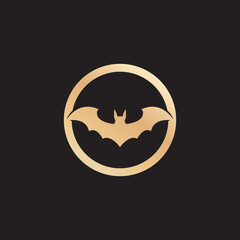 golden bat on black background vector logo icon illustration