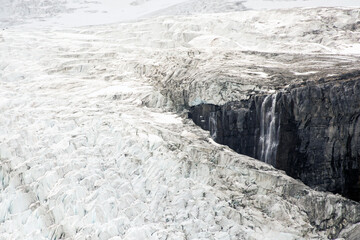 Fototapeta na wymiar Waterfall on glacier