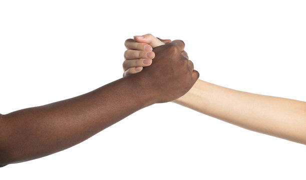 Multiethnic young women hold hands together to each other, they show business friend team, have positive expressions agreement. Handshake business unity concept. white background isolated